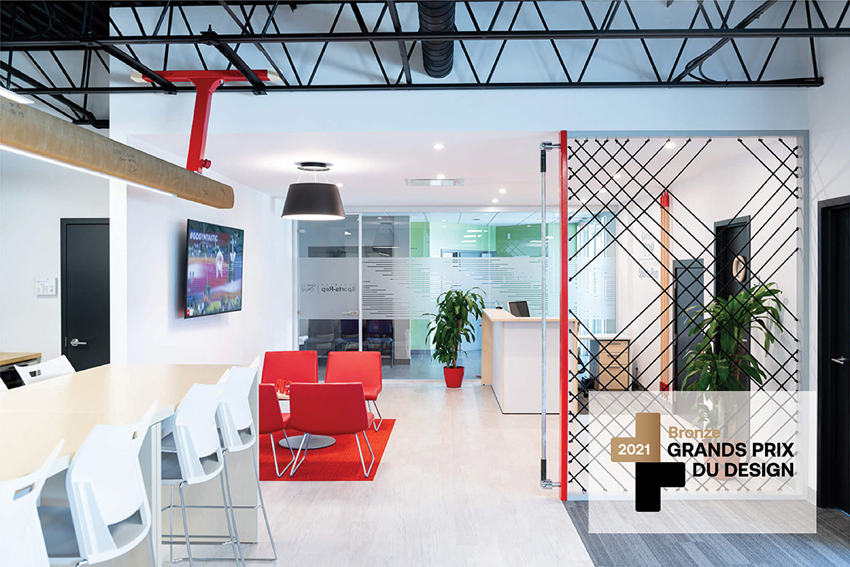 aménagement de bureaux de la compagnie Division Sports Rep, réalisé par la firme de design intérieur et d’architecture d’intérieur Espazio